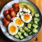 Avocado & Soft-Boiled Egg Breakfast Plate with Feta, Olives & Veggies